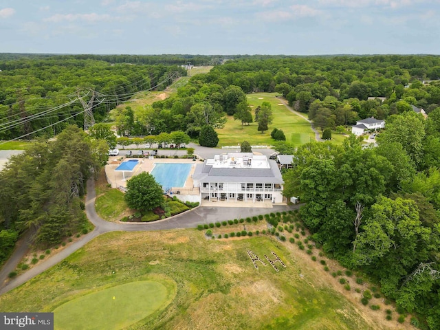 aerial view with a wooded view