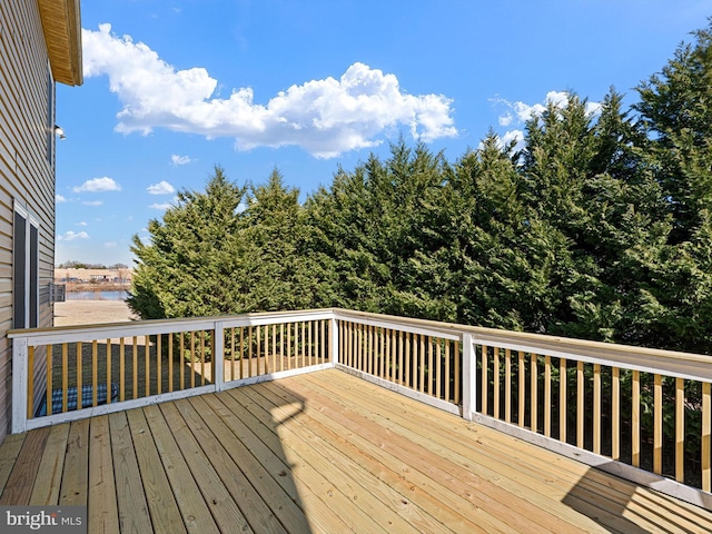 deck featuring a water view