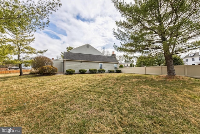 view of yard featuring fence