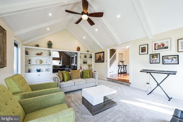 living room with vaulted ceiling with beams, ceiling fan, stairs, light carpet, and recessed lighting