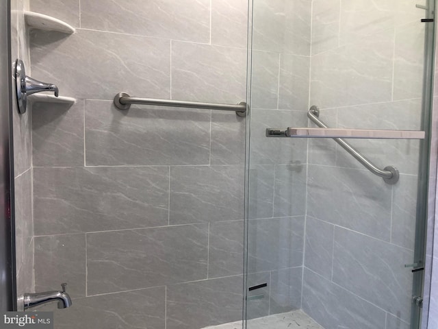 bathroom with a stall shower