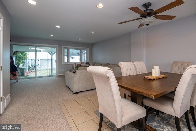 dining area with recessed lighting, light colored carpet, light tile patterned flooring, and a ceiling fan