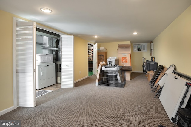 interior space with recessed lighting, baseboards, washer / clothes dryer, and carpet