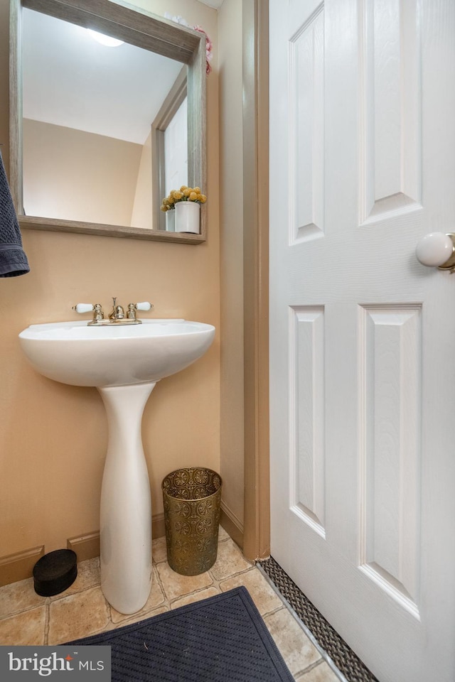 bathroom with tile patterned flooring