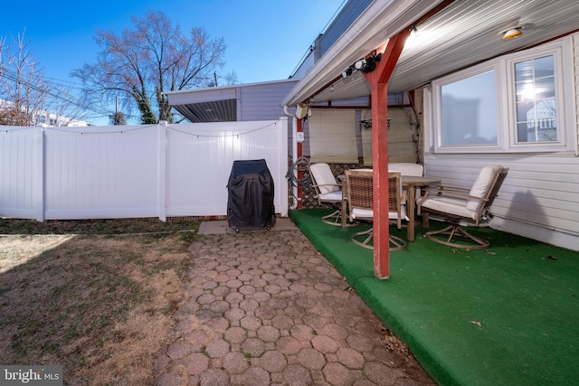 view of yard with a patio area and fence