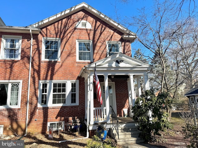 view of front of home with brick siding