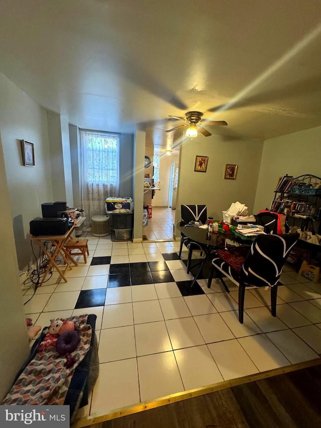 dining room featuring tile patterned flooring and a ceiling fan