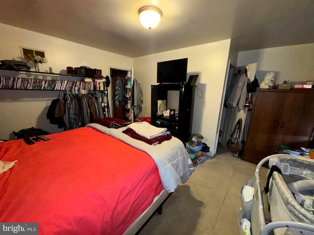 bedroom featuring concrete floors