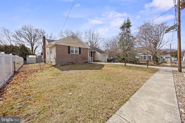 view of home's exterior featuring fence, concrete driveway, a garage, brick siding, and a chimney