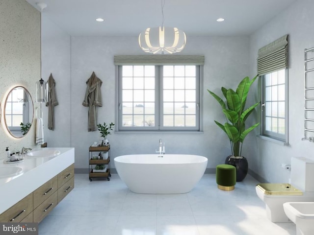 bathroom with a bidet, double vanity, a freestanding bath, a sink, and toilet