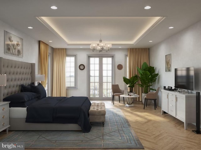 bedroom featuring recessed lighting, an inviting chandelier, and a tray ceiling