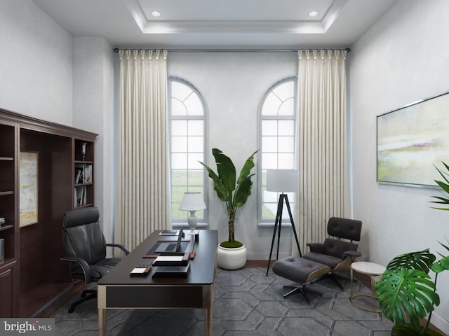 office area featuring a raised ceiling, recessed lighting, baseboards, and a wealth of natural light