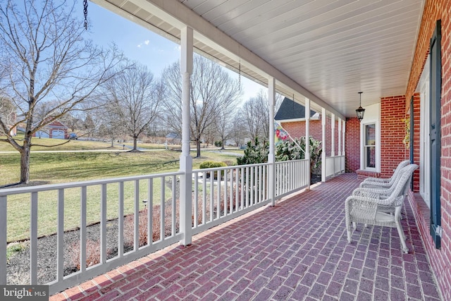 view of patio featuring a porch