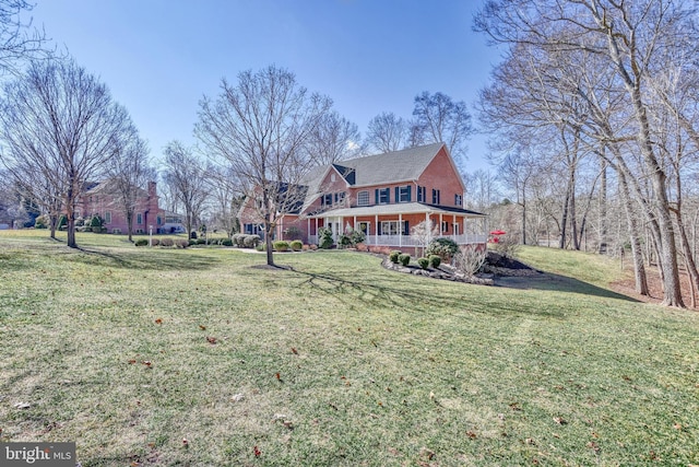 exterior space with a lawn and covered porch