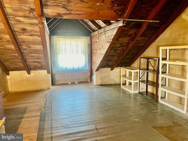 attic featuring an upstairs landing