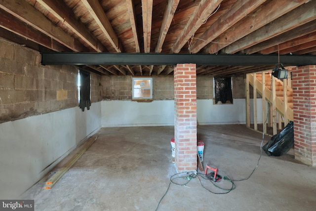 basement featuring stairway