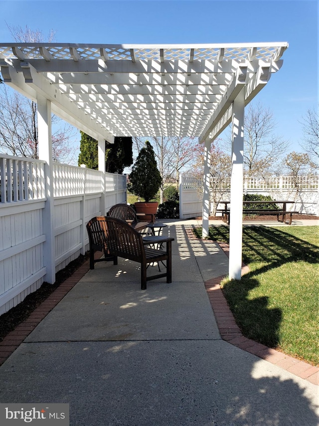 view of patio with a fenced backyard and a pergola