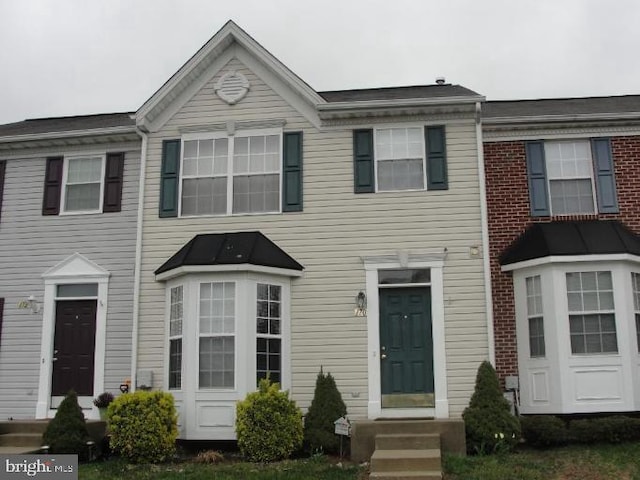 view of property featuring entry steps