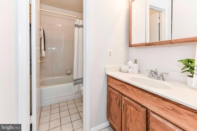 full bath featuring tile patterned flooring, shower / bath combination with curtain, vanity, and toilet