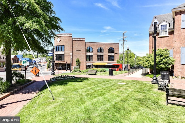 surrounding community featuring a lawn