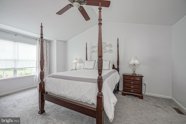 bedroom featuring visible vents, lofted ceiling, carpet flooring, baseboards, and ceiling fan