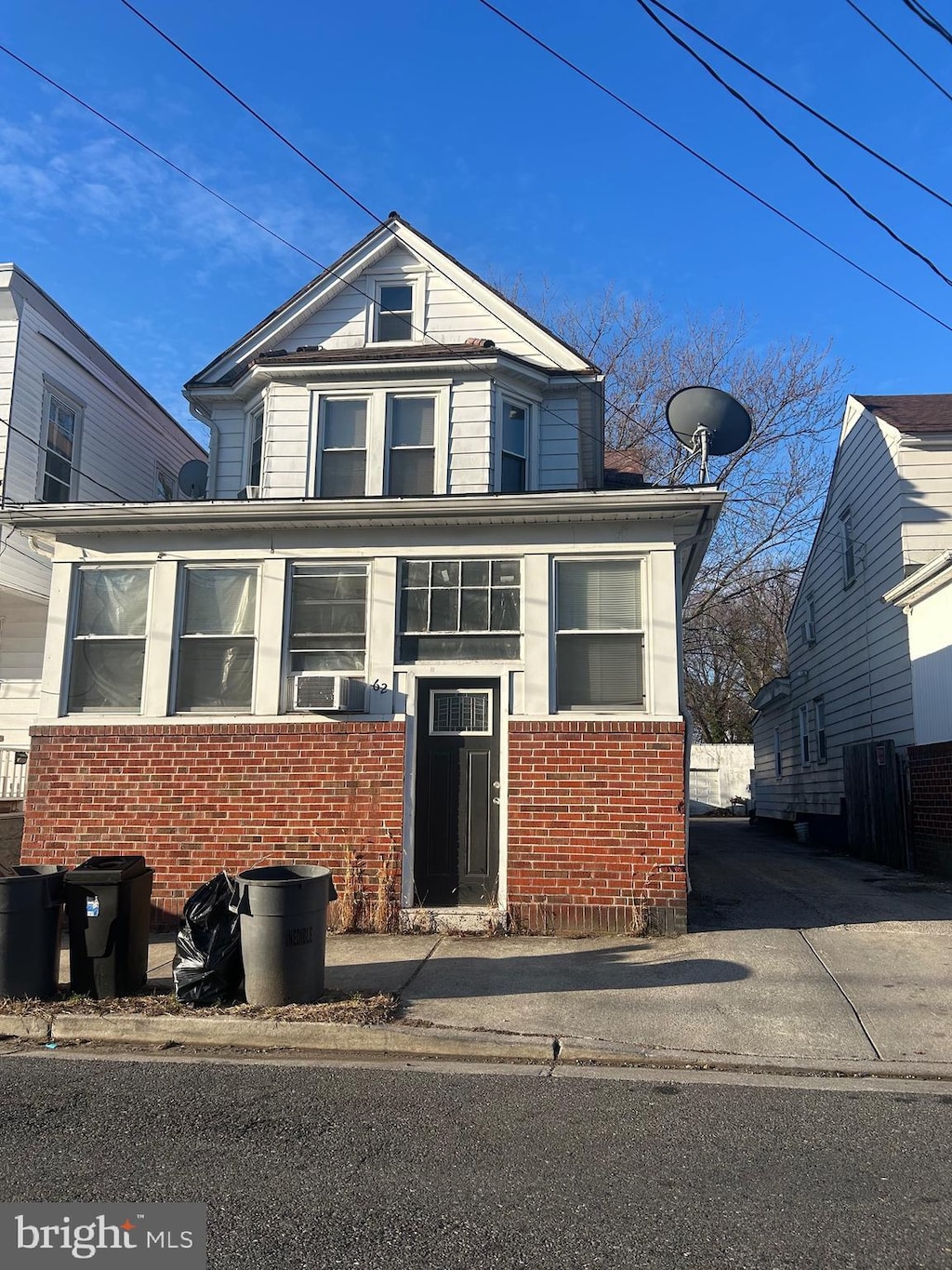 view of front of house with brick siding