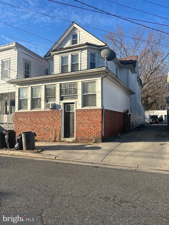 view of front of home with brick siding