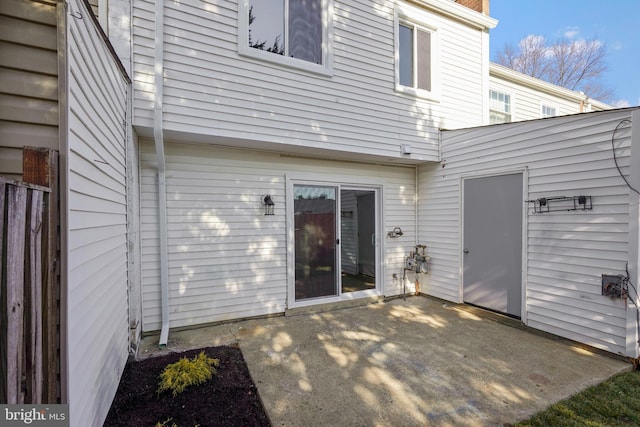 rear view of house featuring a patio area