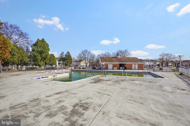 community pool with a patio