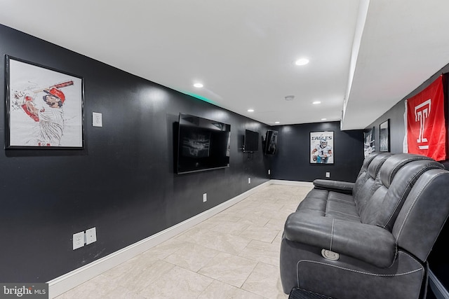 home theater with recessed lighting and baseboards