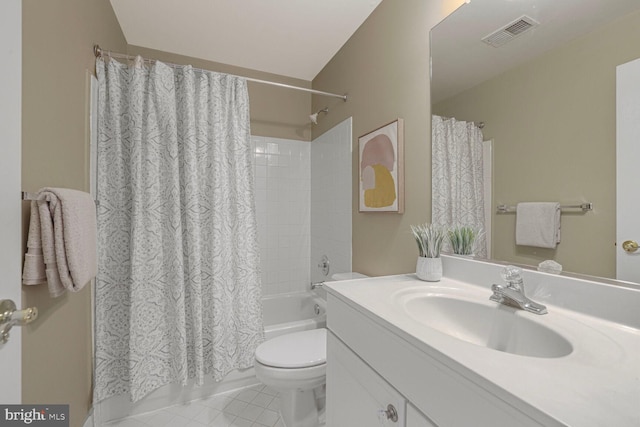 bathroom featuring visible vents, toilet, shower / bath combo, tile patterned floors, and vanity