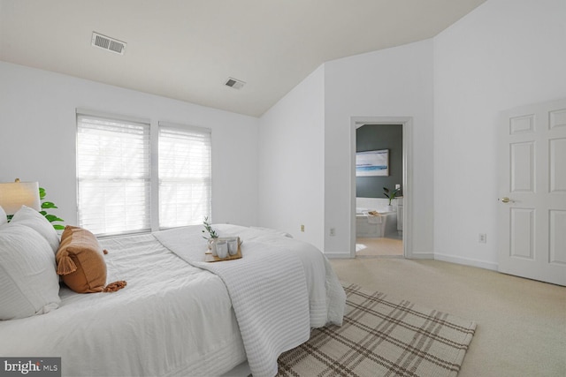 bedroom featuring visible vents, baseboards, lofted ceiling, and carpet floors