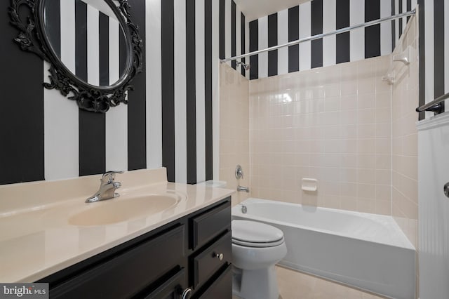 full bathroom featuring wallpapered walls,  shower combination, toilet, and vanity