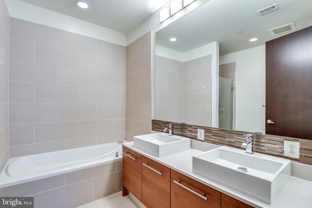 full bath featuring a sink, visible vents, and a stall shower