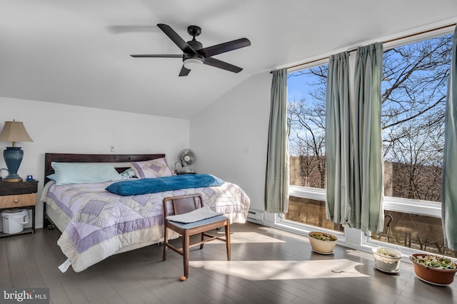 bedroom featuring hardwood / wood-style floors, lofted ceiling, a ceiling fan, and a baseboard radiator