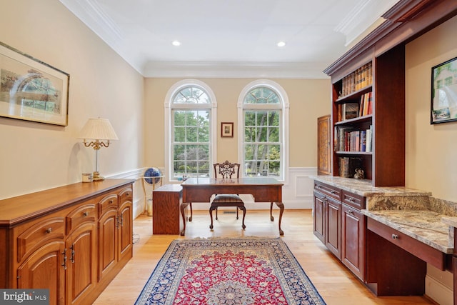 office area featuring crown molding, light wood-style flooring, recessed lighting, and wainscoting