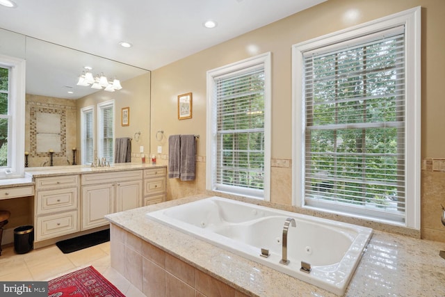 full bath with recessed lighting, vanity, a whirlpool tub, and tile patterned flooring