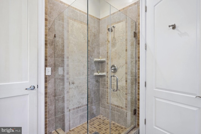 full bathroom featuring a shower stall