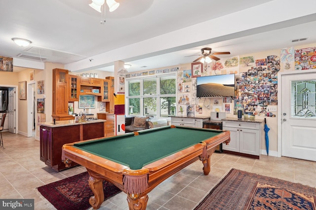 rec room featuring light tile patterned floors, pool table, baseboards, and a ceiling fan