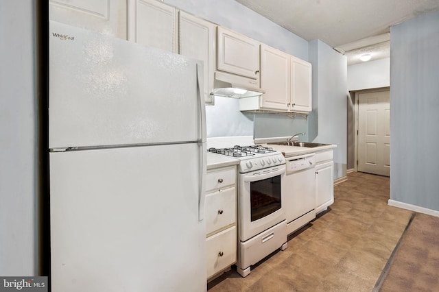 kitchen with white appliances, baseboards, light countertops, white cabinets, and under cabinet range hood