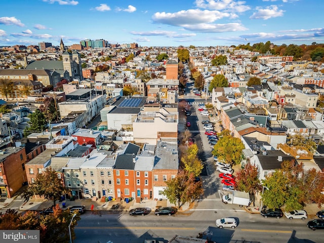 drone / aerial view featuring a city view