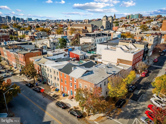 birds eye view of property featuring a view of city