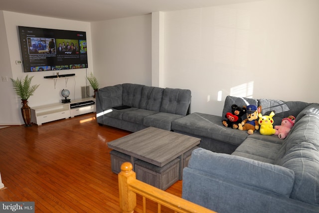 living room with wood finished floors