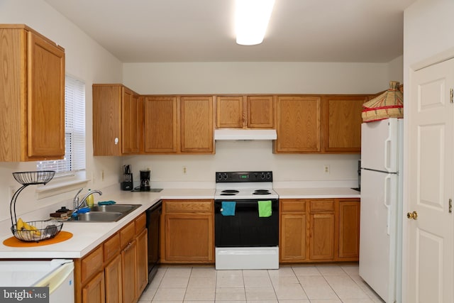 kitchen with under cabinet range hood, black dishwasher, range with electric stovetop, freestanding refrigerator, and a sink