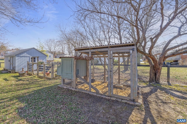 view of poultry coop with a yard