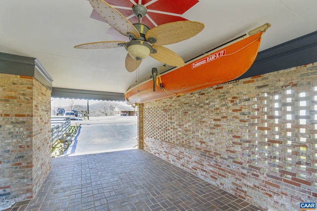 view of patio / terrace featuring ceiling fan