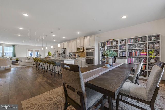 dining room featuring recessed lighting and dark wood-style flooring