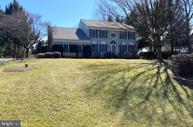 colonial house with a front yard