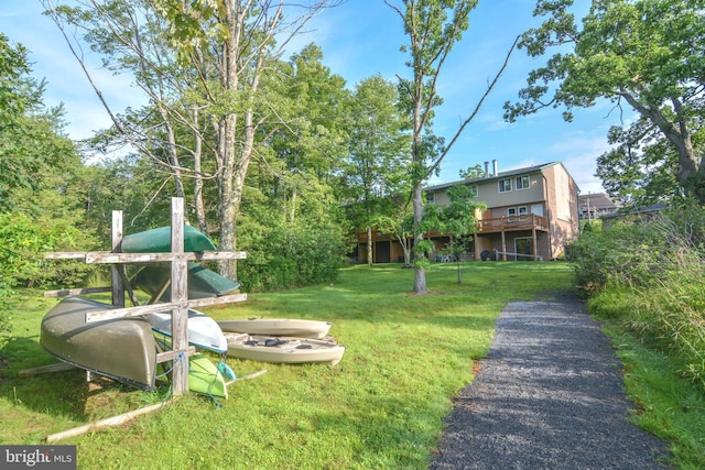 view of yard with a wooden deck