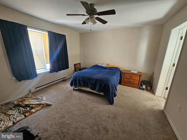 bedroom featuring baseboards, a baseboard heating unit, ceiling fan, and carpet floors